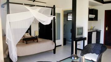 Bungalow Deluxe, 1 très grand lit, accessible aux personnes à mobilité réduite, vue montagne | Literie de qualité supérieure, coffres-forts dans les chambres, bureau