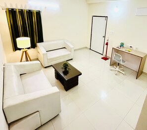 Apartment, 1 Bedroom, Smoking | Living area | 32-inch flat-screen TV with cable channels - Namaha Stays (Hyderabad)