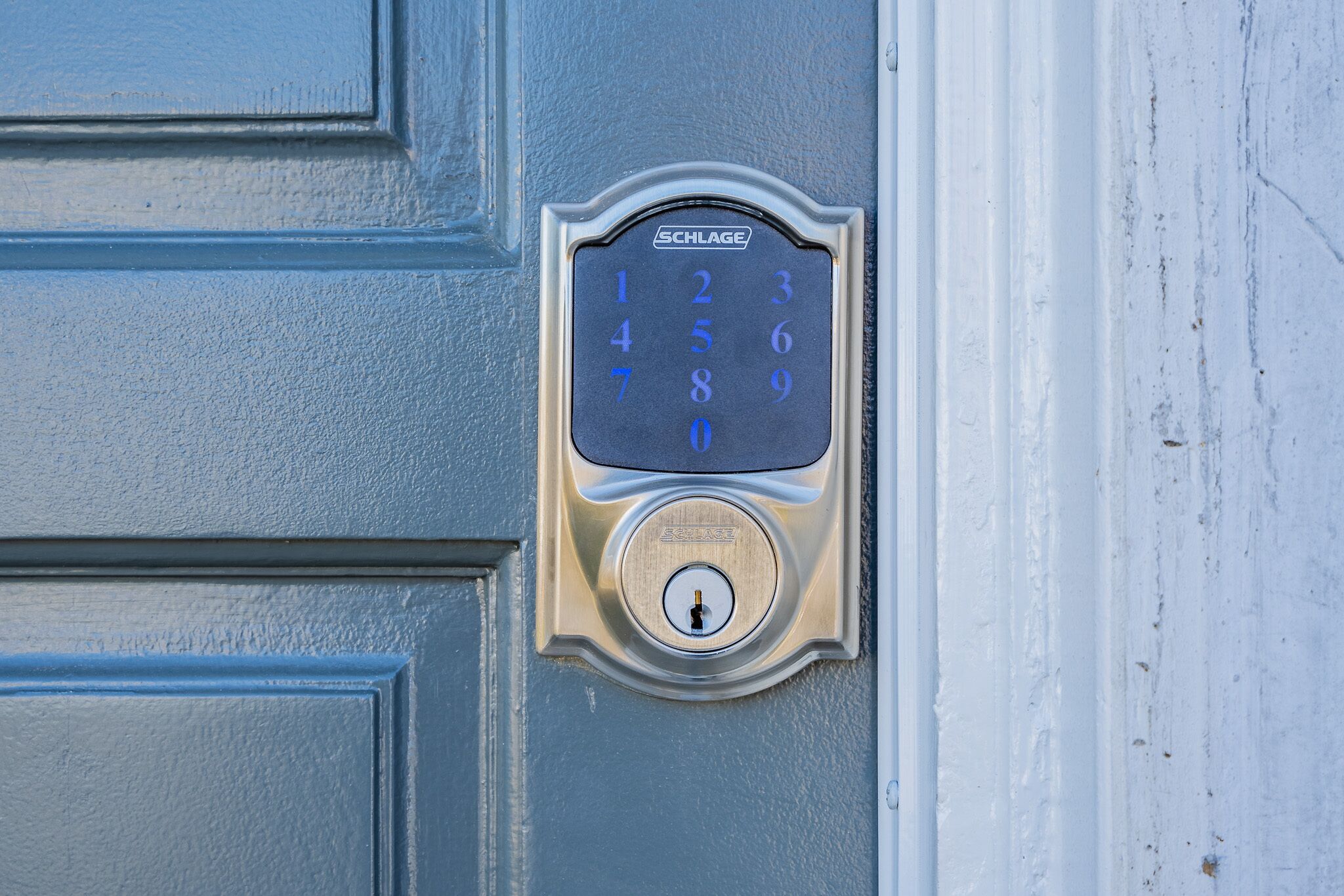 A door with a numeric keypad lock.