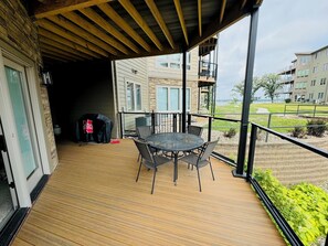 Outdoor dining - Lakefront Okoboji Condo at Bridges Bay! Coronado Condo #100. Sleeps 10. (Arnolds Park)