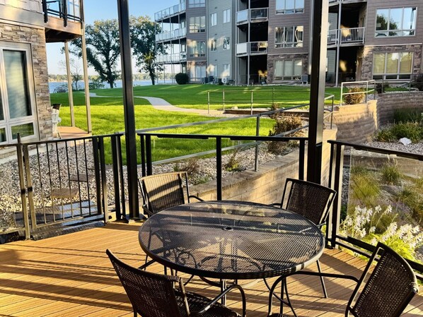 Outdoor dining - Lakefront Okoboji Condo at Bridges Bay! Coronado Condo #100. Sleeps 10. (Arnolds Park)