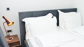 Deluxe Apartment, City View | Iron/ironing board, free cribs/infant beds, free WiFi, bed sheets