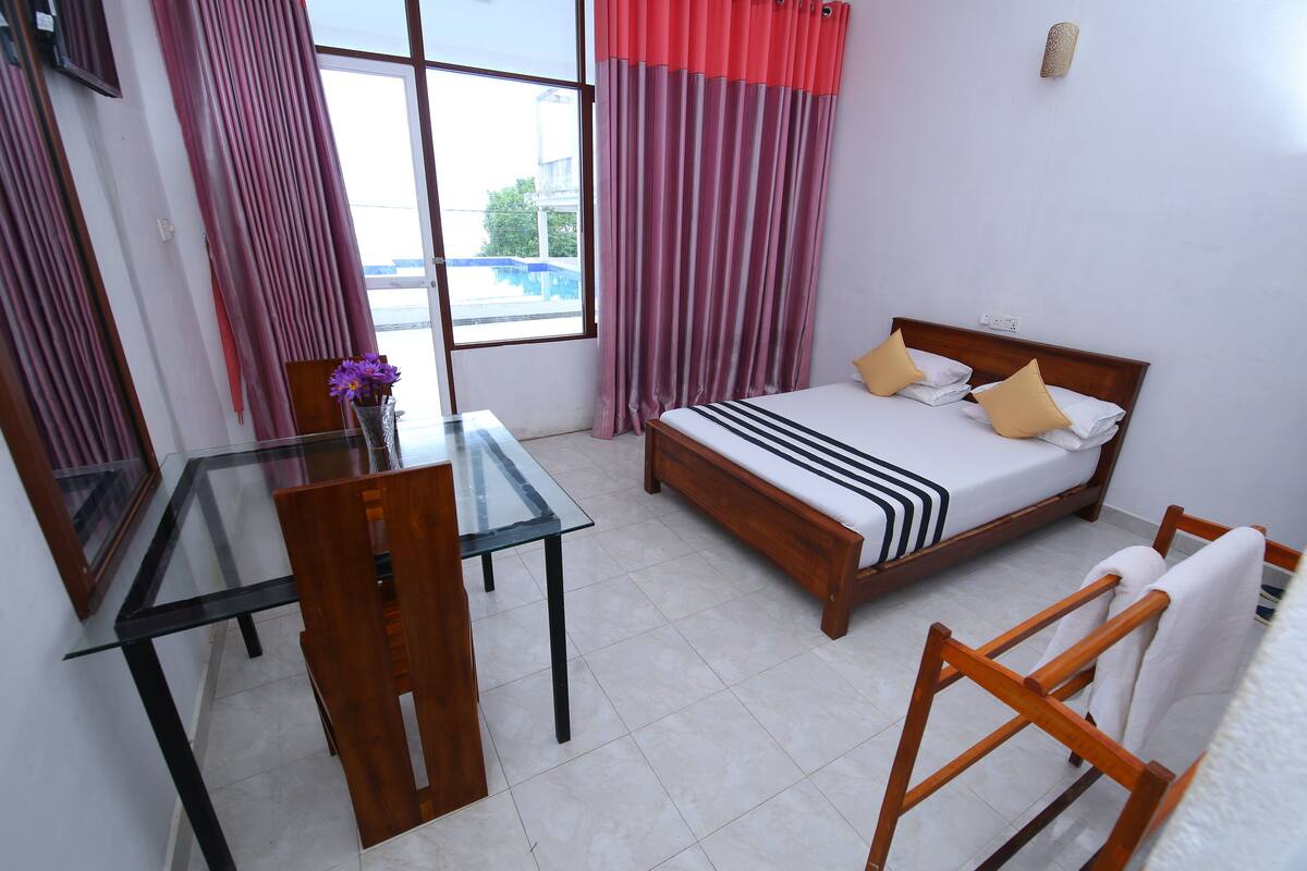 Standard Double Room, Pool View | Desk, laptop workspace, iron/ironing board, free WiFi