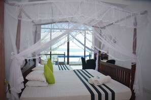 Deluxe Quadruple Room, Sea View (AC) | Desk, laptop workspace, iron/ironing board, free WiFi