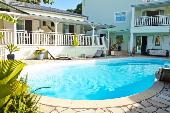 Outdoor pool, pool umbrellas, pool loungers