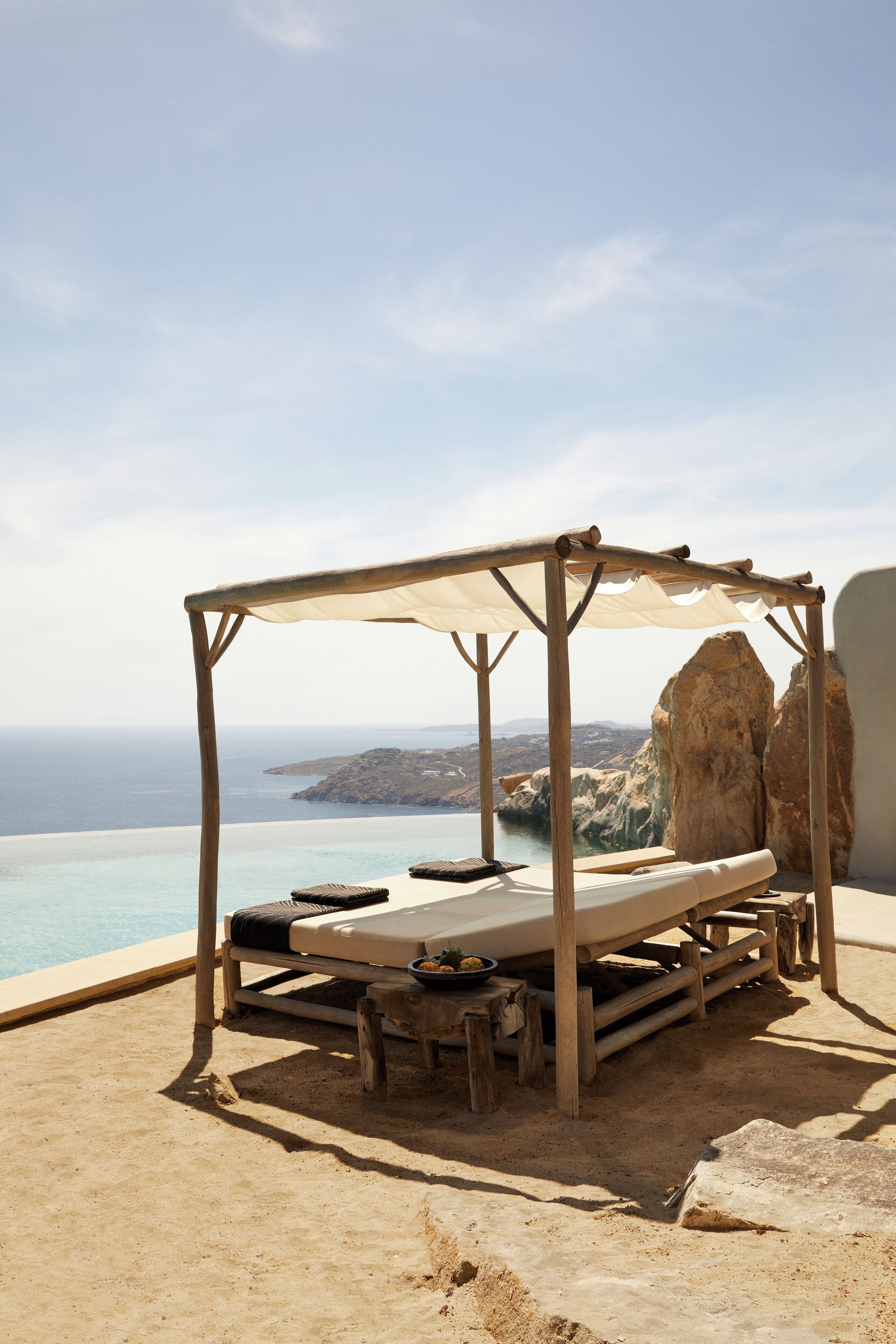 Outdoor pool, open 10:00 AM to 8:00 PM, pool umbrellas, pool loungers