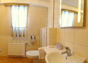 Shower, free toiletries, hair dryer, towels