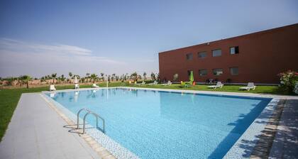 Appartement neuf, entouré de verdure + piscine