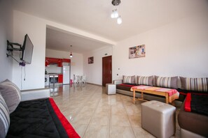 Exclusive Apartment, 4 Bedrooms, Pool View, Garden Area | Living area