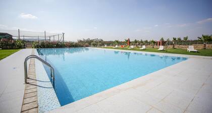 Appartement neuf, entouré de verdure + piscine