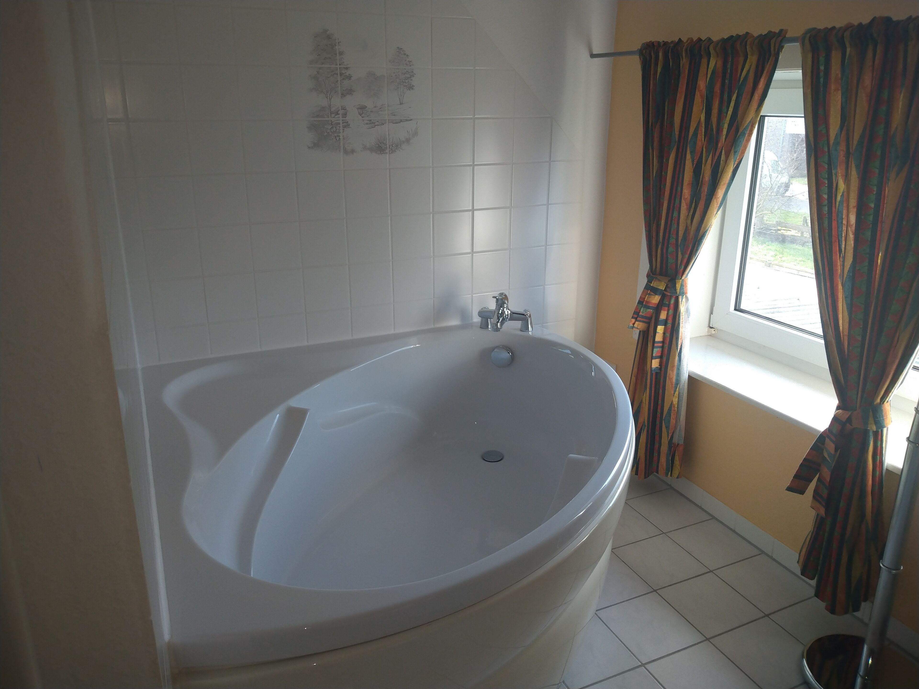 comfort apartment, bathtub, garden view | bathroom | shower, free toiletries, hair dryer, towels