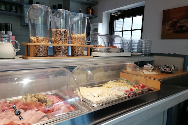 Daily buffet breakfast (EUR 11 per person)