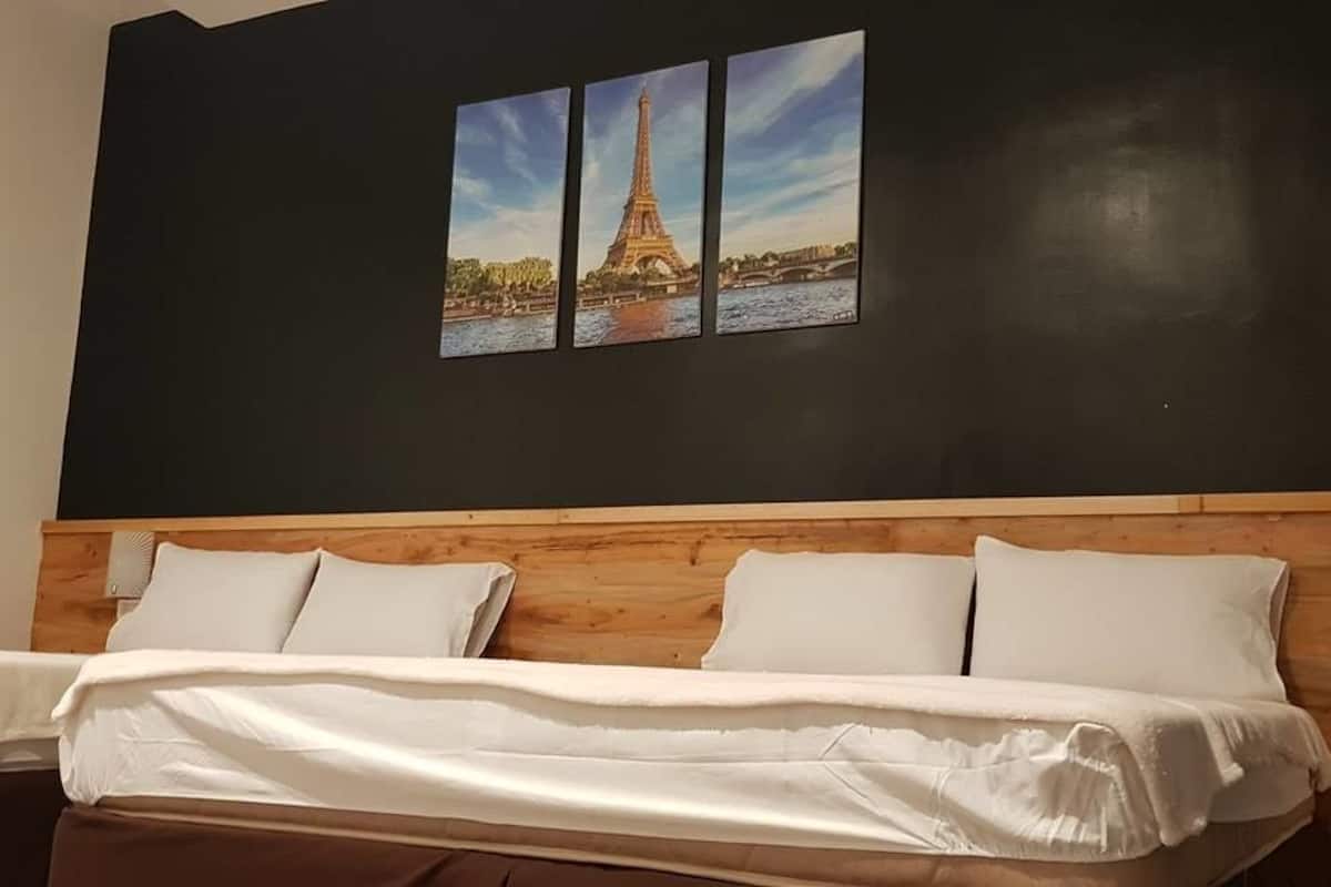 family single room, multiple beds | 1 bedroom, desk, laptop workspace, bed sheets