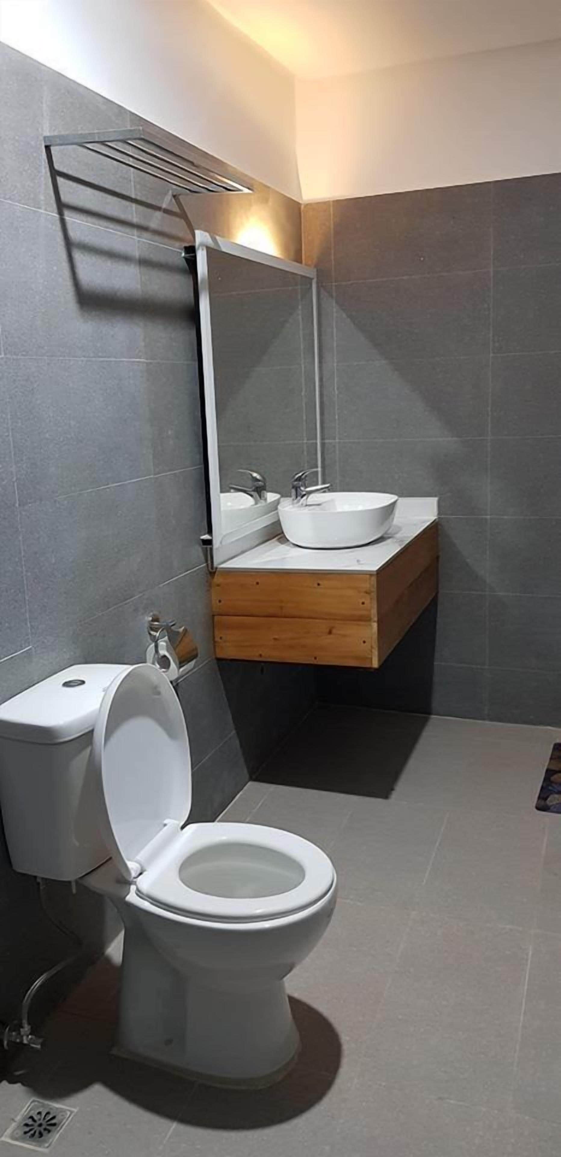 family single room, multiple beds | bathroom | shower, free toiletries, bidet, towels