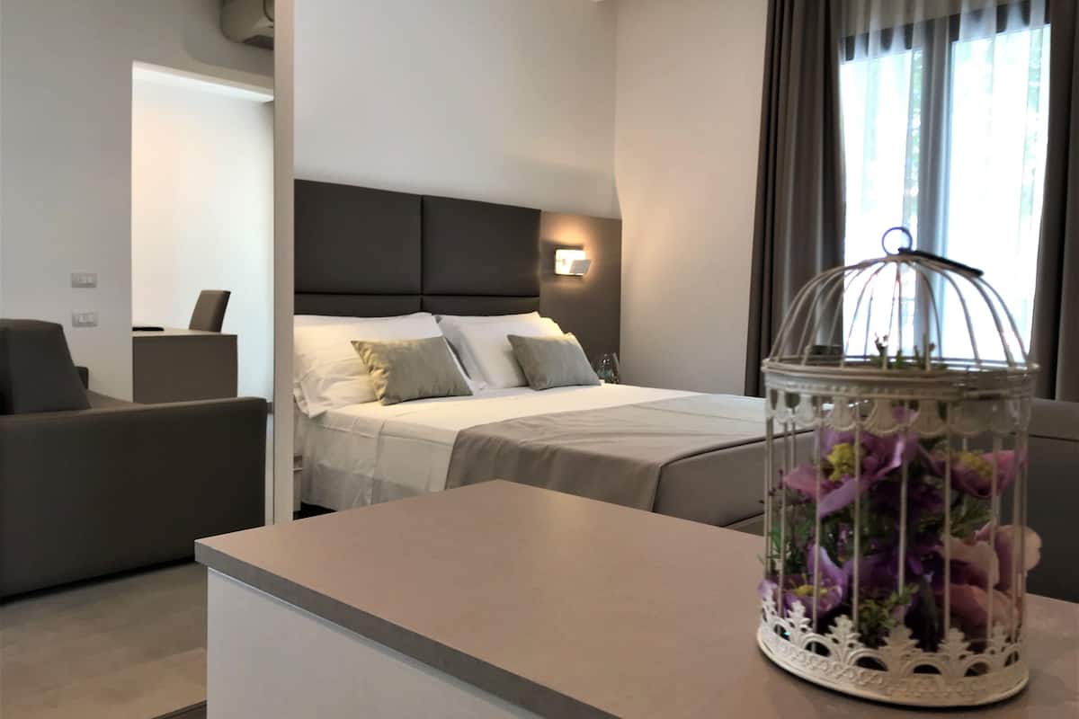 Junior Suite, Garden View | In-room safe, desk, blackout curtains, free WiFi