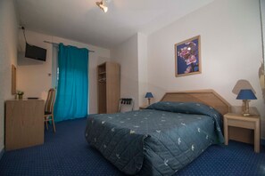 Quarto standard, para não fumantes, vista para a cidade | Roupas de cama premium, individualmente decorados