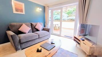 Apartment, Multiple Beds (Dog Friendly) | Living area | TV