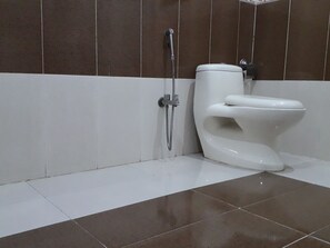 Suite, 1 King Bed, Non Smoking | Bathroom - Dhimi Lodges (Lahore)