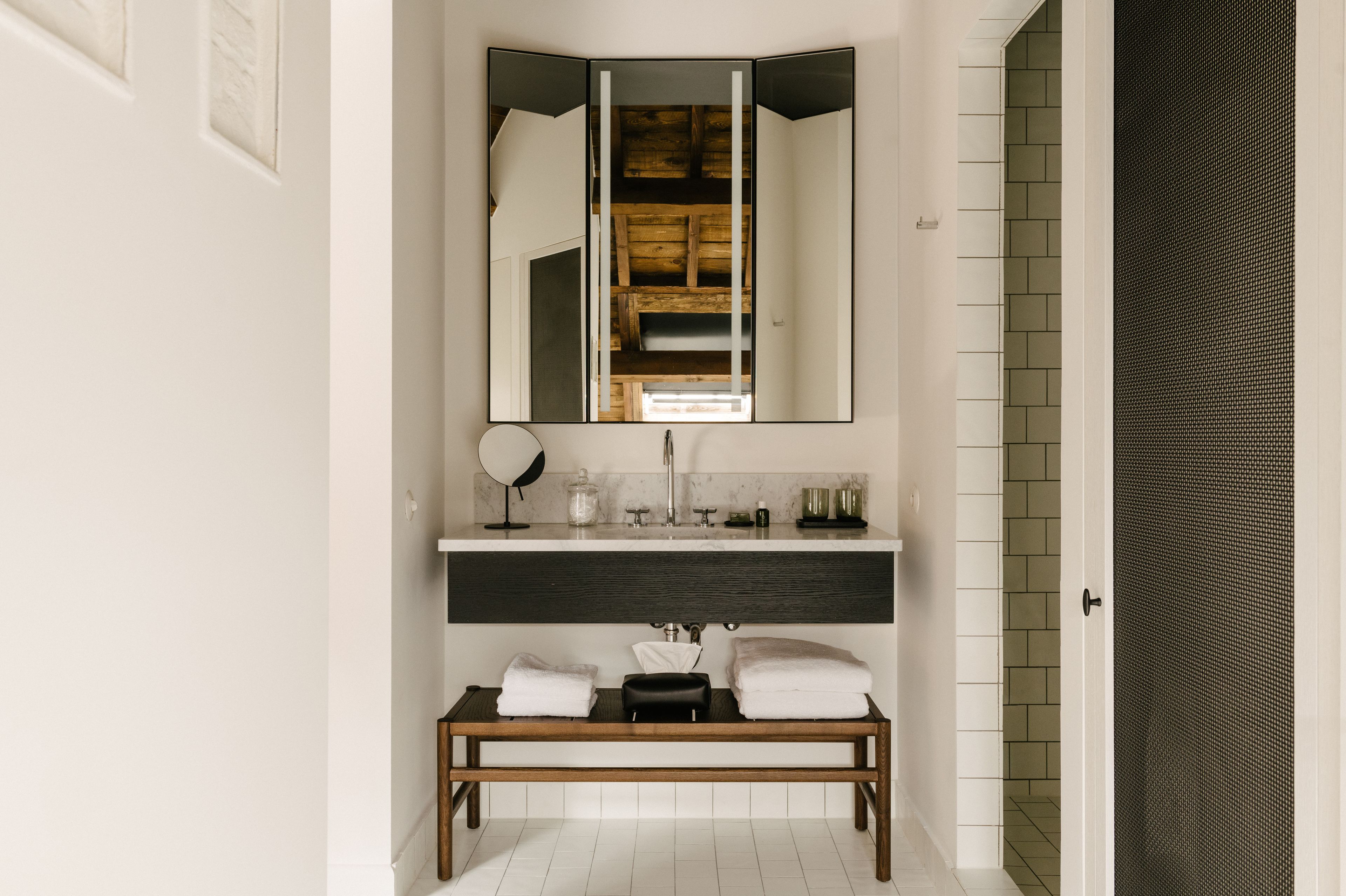 designer toiletries, hair dryer, bathrobes, slippers