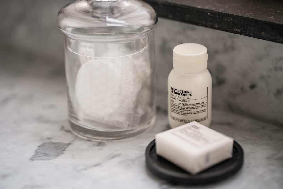 designer toiletries, hair dryer, bathrobes, slippers