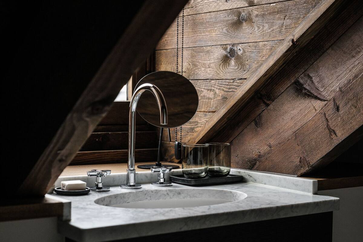 deluxe room | bathroom | designer toiletries, hair dryer, bathrobes, slippers