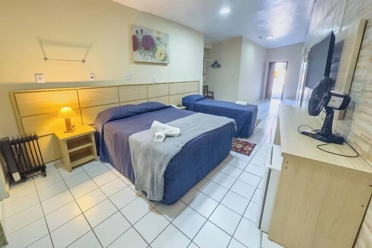 Habitación económica, en edificio anexo | Minibar, wifi gratis, ropa de cama