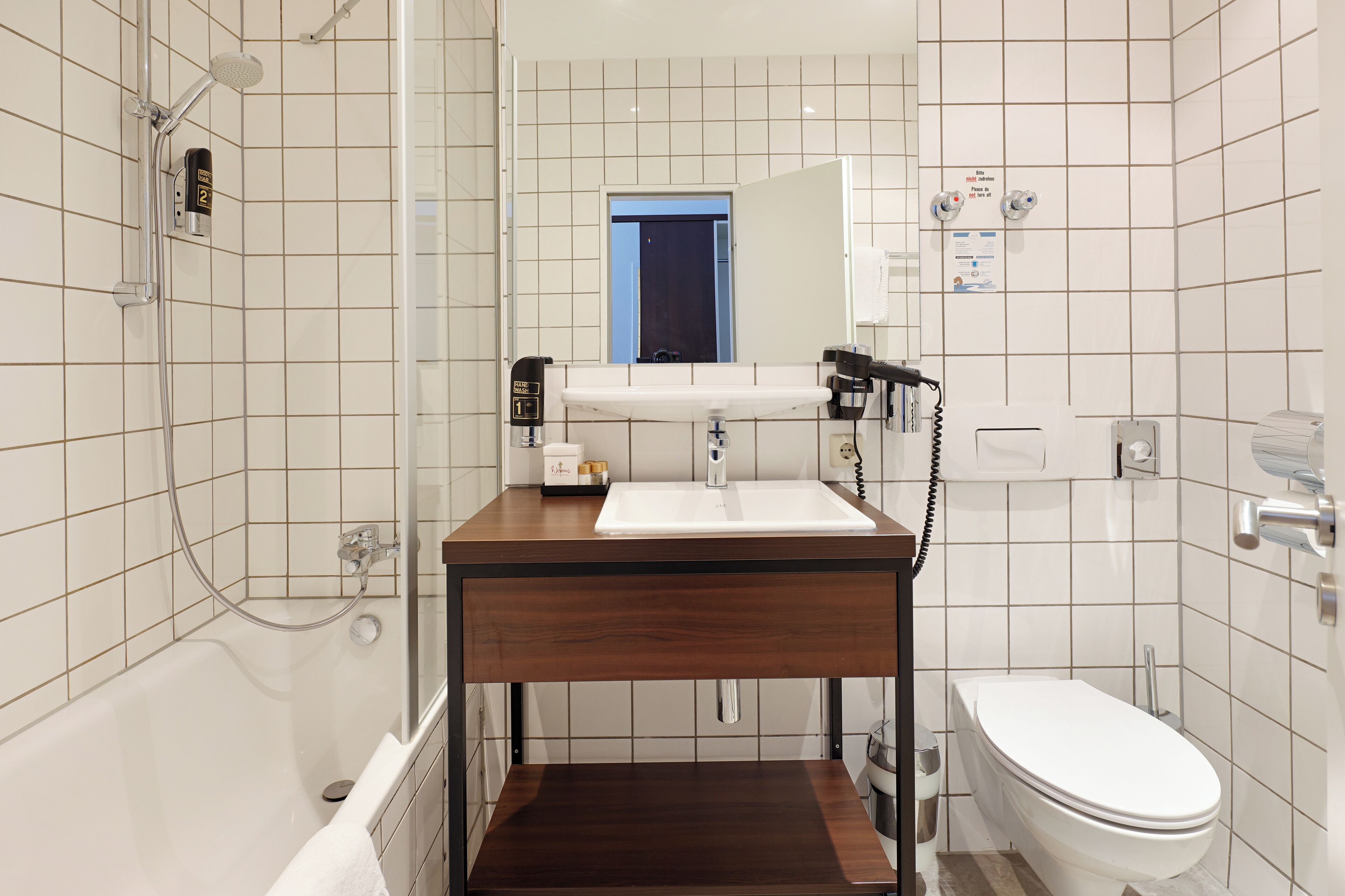 twin room | bathroom | deep-soaking bathtub, free toiletries, hair dryer, bathrobes