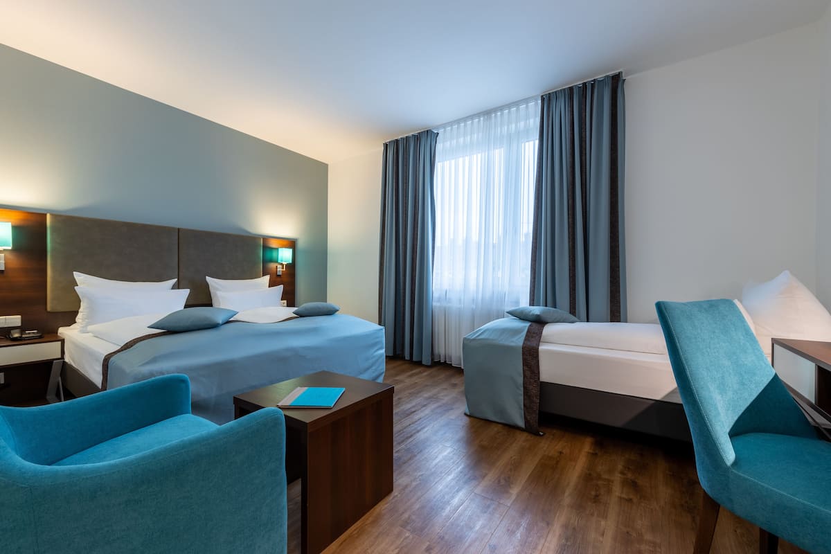 Camera tripla | Biancheria da letto ipoallergenica, minibar, una cassaforte in camera