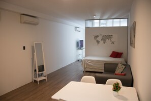 Apartment, 1 Doppelbett, Nichtraucher | Wohnbereich | Flachbildfernseher