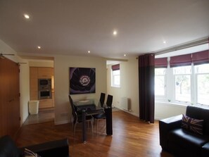 Apartment, 2 Bedrooms, Non Smoking (110F) | Living area | Flat-screen TV