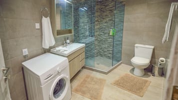 House | Bathroom | Shower, rainfall showerhead, hair dryer, towels