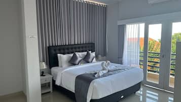Habitación doble Premier, 1 cama matrimonial, vista al mar | Minibar, caja de seguridad en la habitación y decoración personalizada