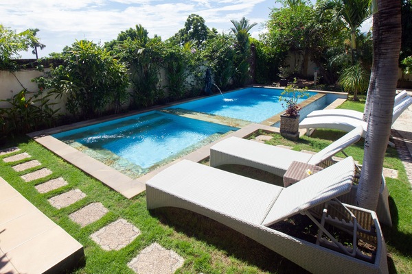 Outdoor pool, open 6:00 AM to 9:30 PM, sun loungers