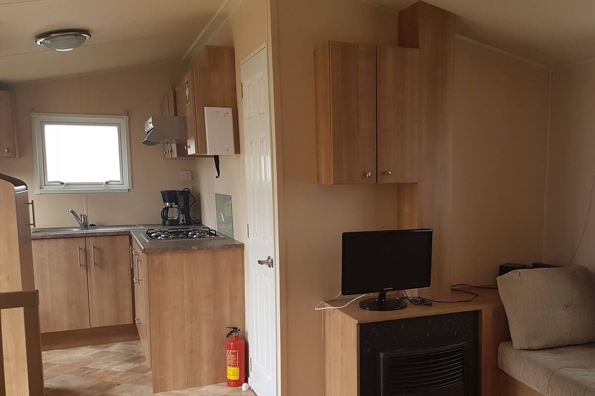 Chalet, 2 Bedrooms (Fortduin) | Living area | Flat-screen TV