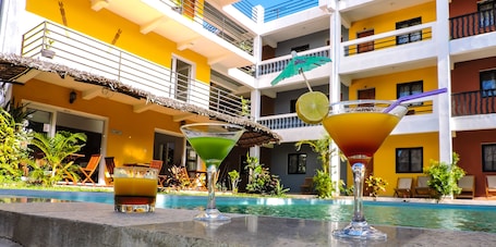 Indoor pool, outdoor pool, pool umbrellas, sun loungers