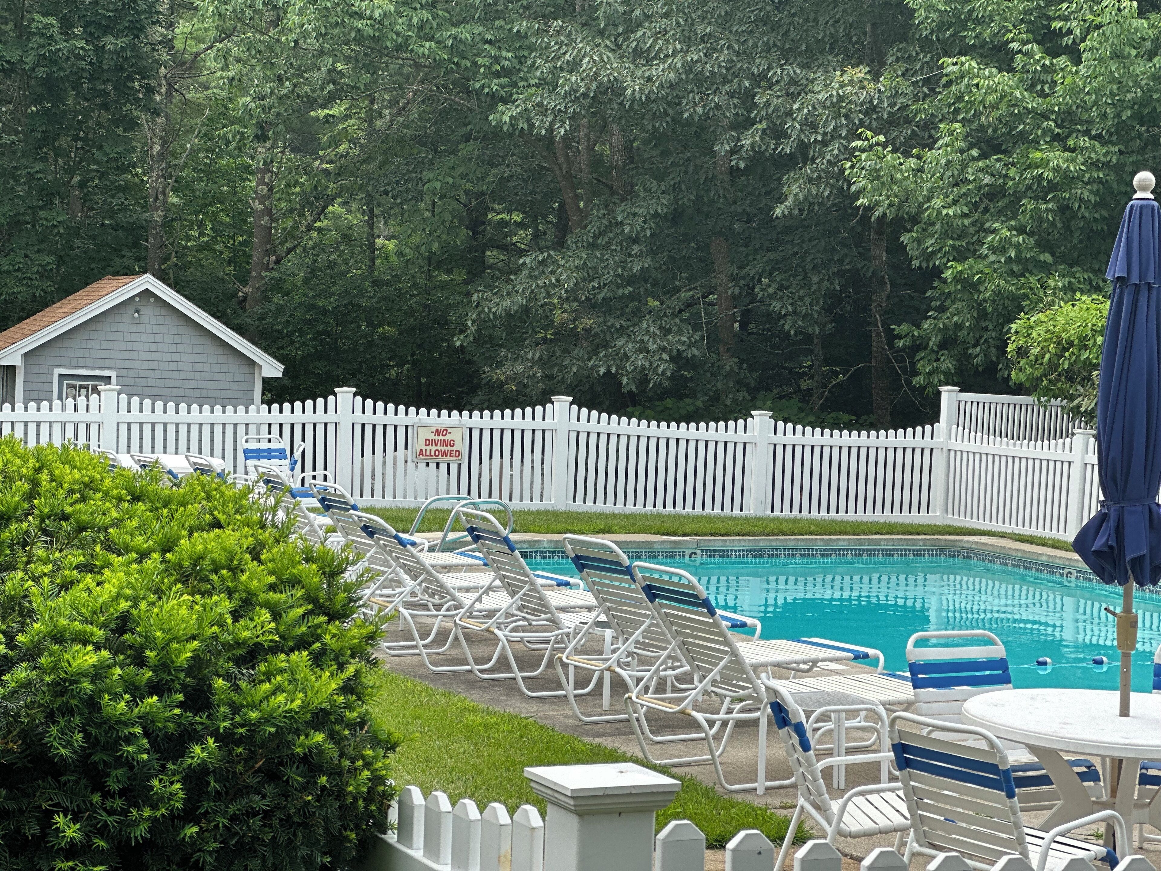 seasonal outdoor pool, open 8:00 am to 8:00 pm, pool umbrellas