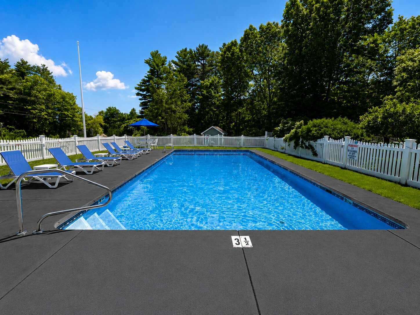 Seasonal outdoor pool, open 8:00 AM to 8:00 PM, pool umbrellas