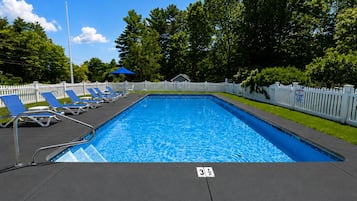 Seasonal outdoor pool, open 8:00 AM to 8:00 PM, pool umbrellas