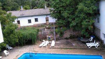 Seasonal outdoor pool, open 11:00 AM to 8:00 PM, sun loungers