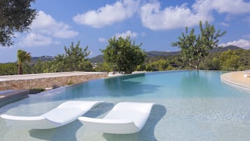 Outdoor pool, sun loungers