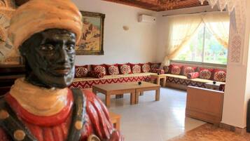 Exclusive Villa, Multiple Bedrooms, Private Pool | Living room | Flat-screen TV, fireplace