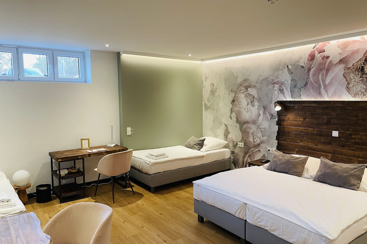 quadruple room | hypo-allergenic bedding, desk, blackout curtains, cots/infant beds