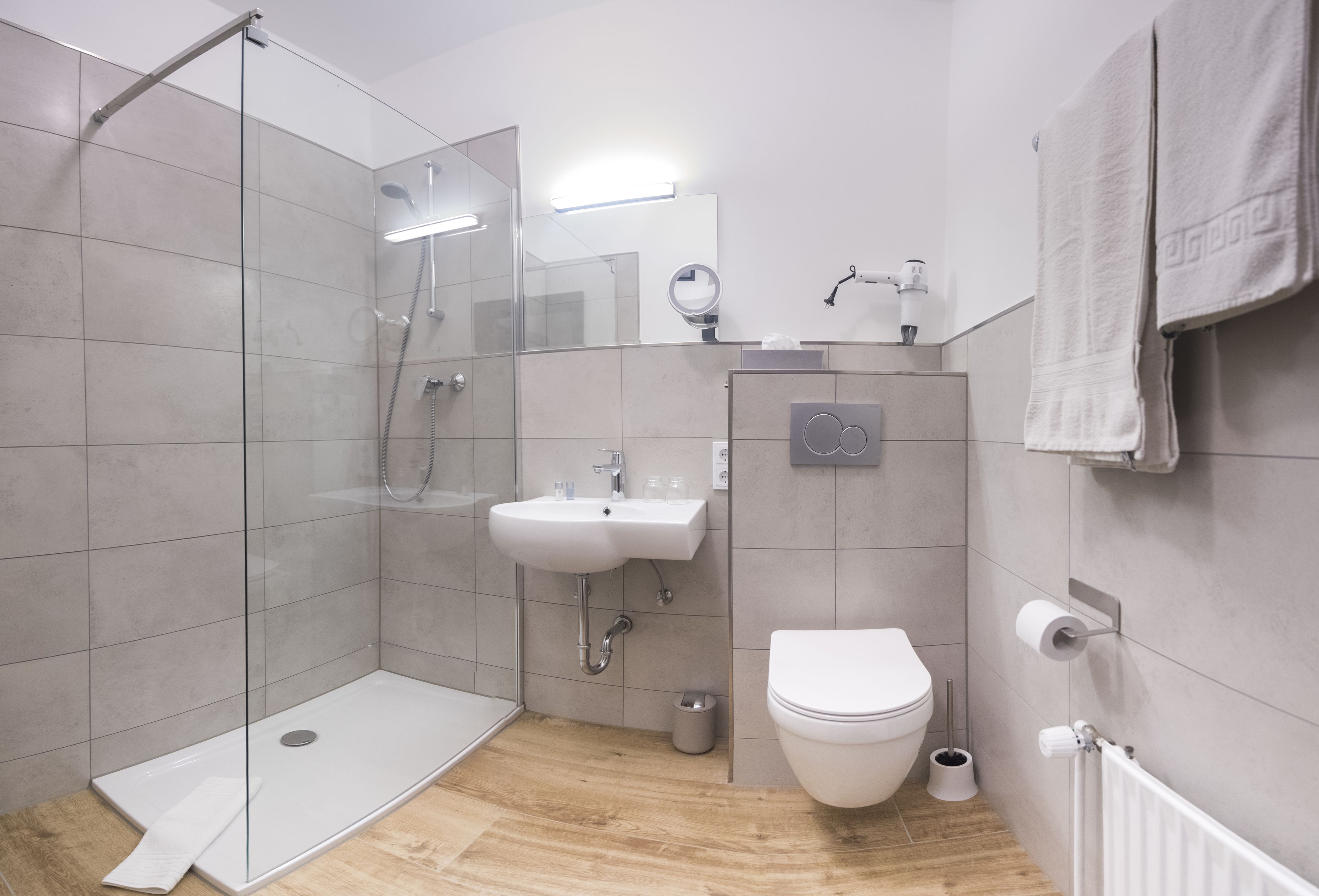 shower, eco-friendly toiletries, hair dryer, towels