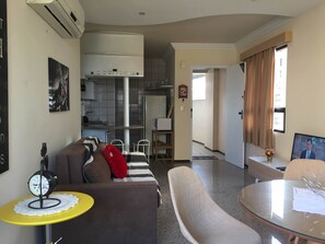 Apartment, Multiple Beds, Beach View | Living area | Flat-screen TV