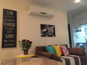 Apartment, Multiple Beds, Beach View | Living area | Flat-screen TV