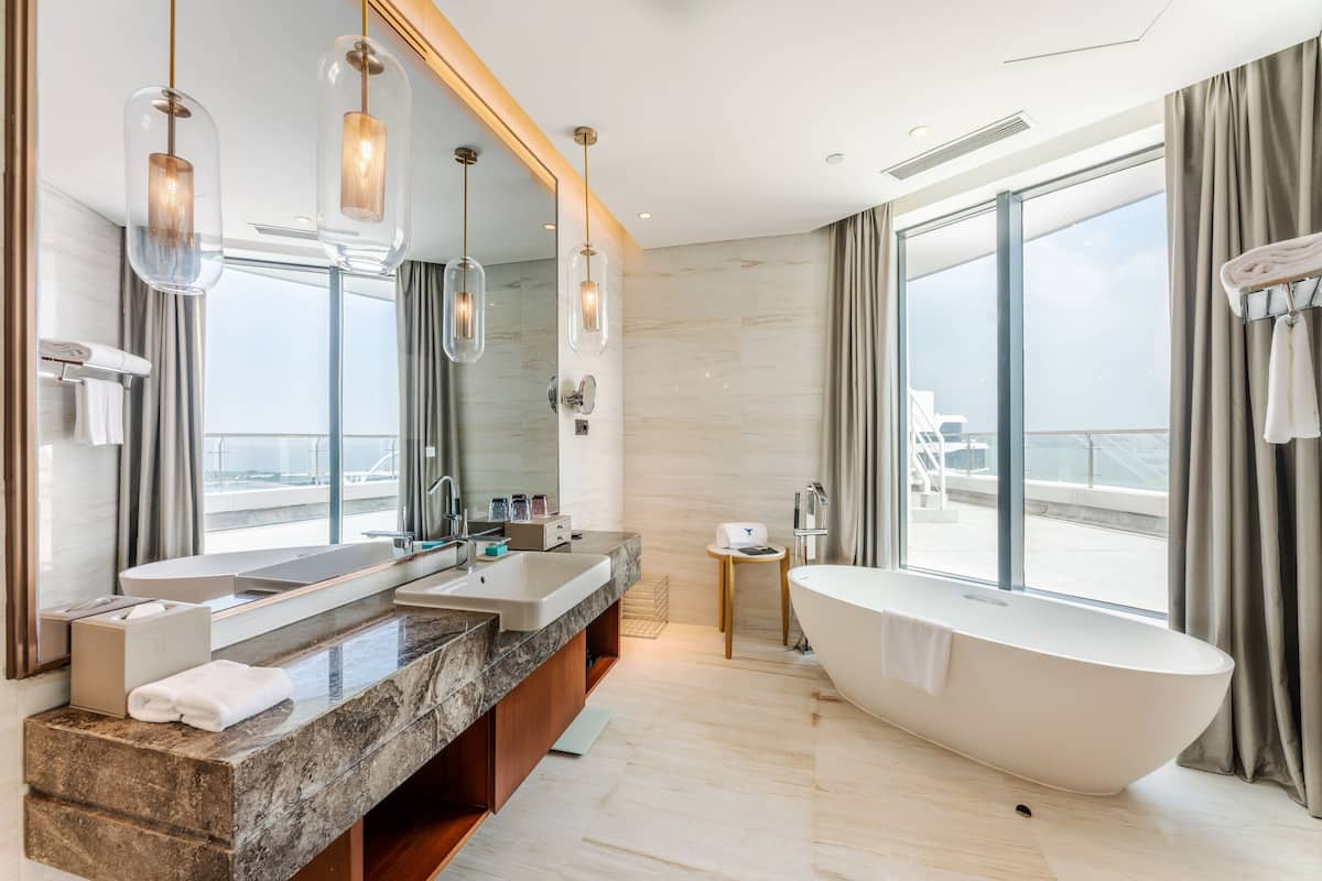 suite, multiple beds, non smoking, bay view (yuzhou bay view suite) | bathroom | rainfall showerhead, hair dryer, bathrobes, slippers