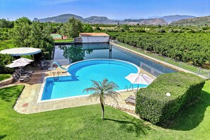 Outdoor pool, pool umbrellas, pool loungers