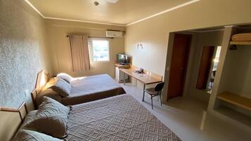 Quadruple Room | Minibar, desk, blackout curtains, free WiFi