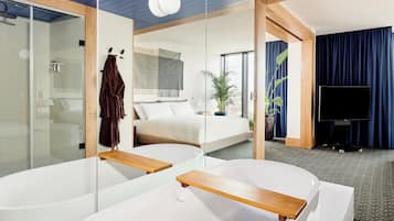 Regadera, amenidades de baño gratuitas, secadora de cabello, batas