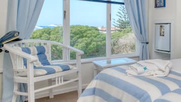 Habitación estándar con 2 camas individuales | Ropa de cama de alta calidad y minibar